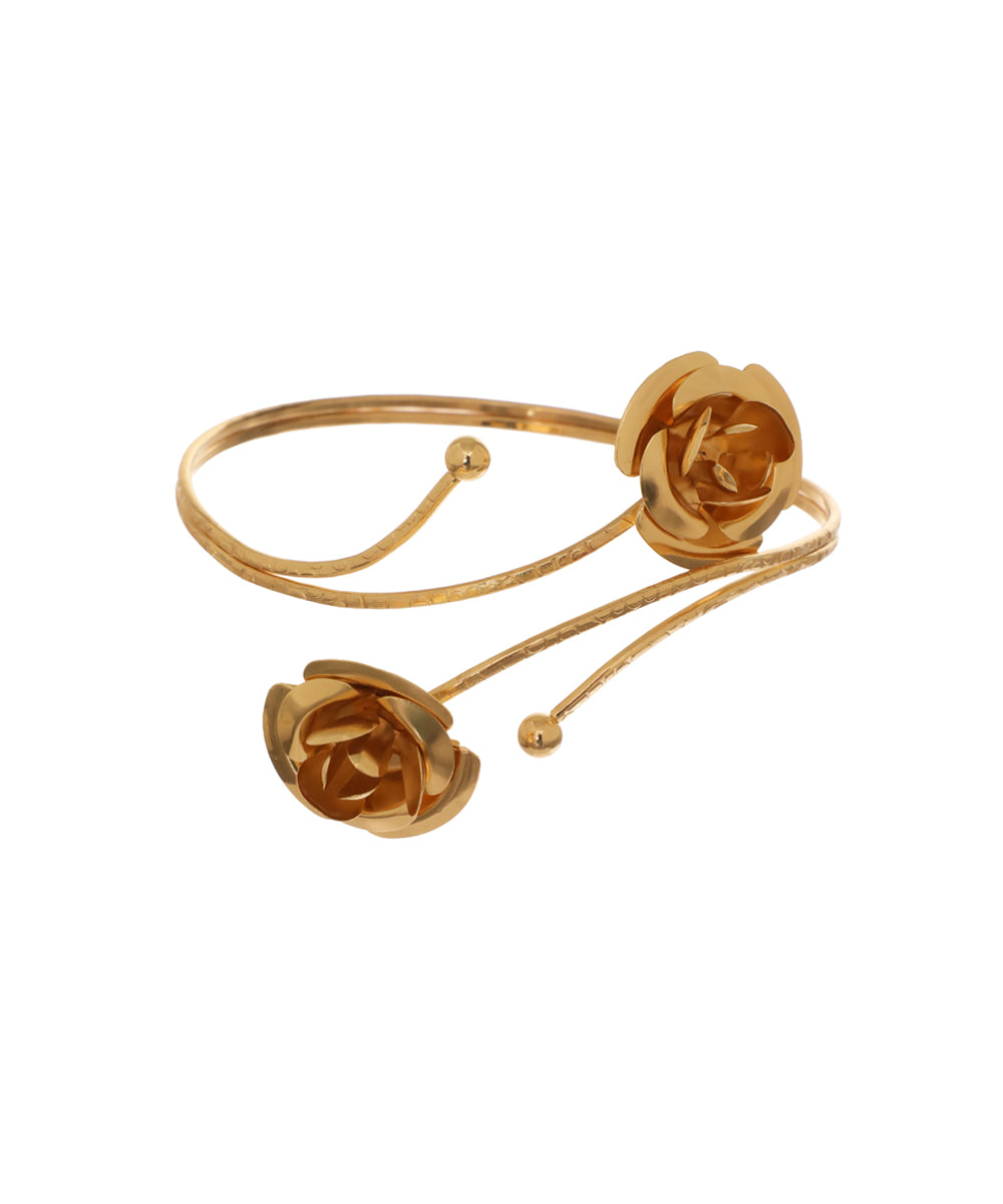 Gold-tone arm cuff with two sculptural rose designs