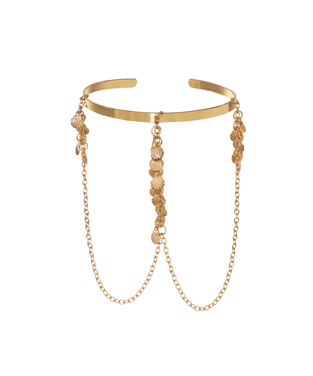 Gold-tone arm cuff with draped chains and small shell charms