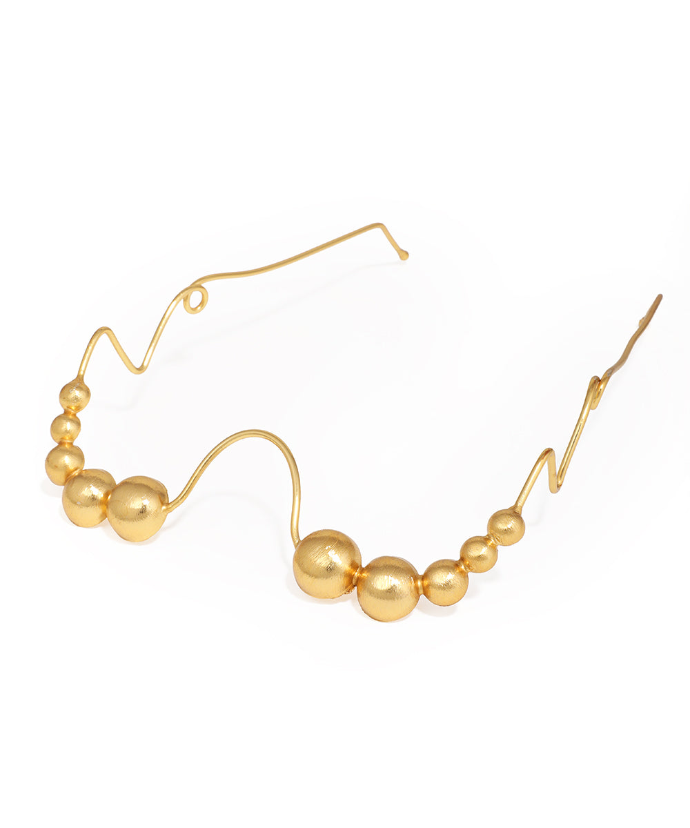Gold-tone facelet with organic wavy design and graduated matte beads
