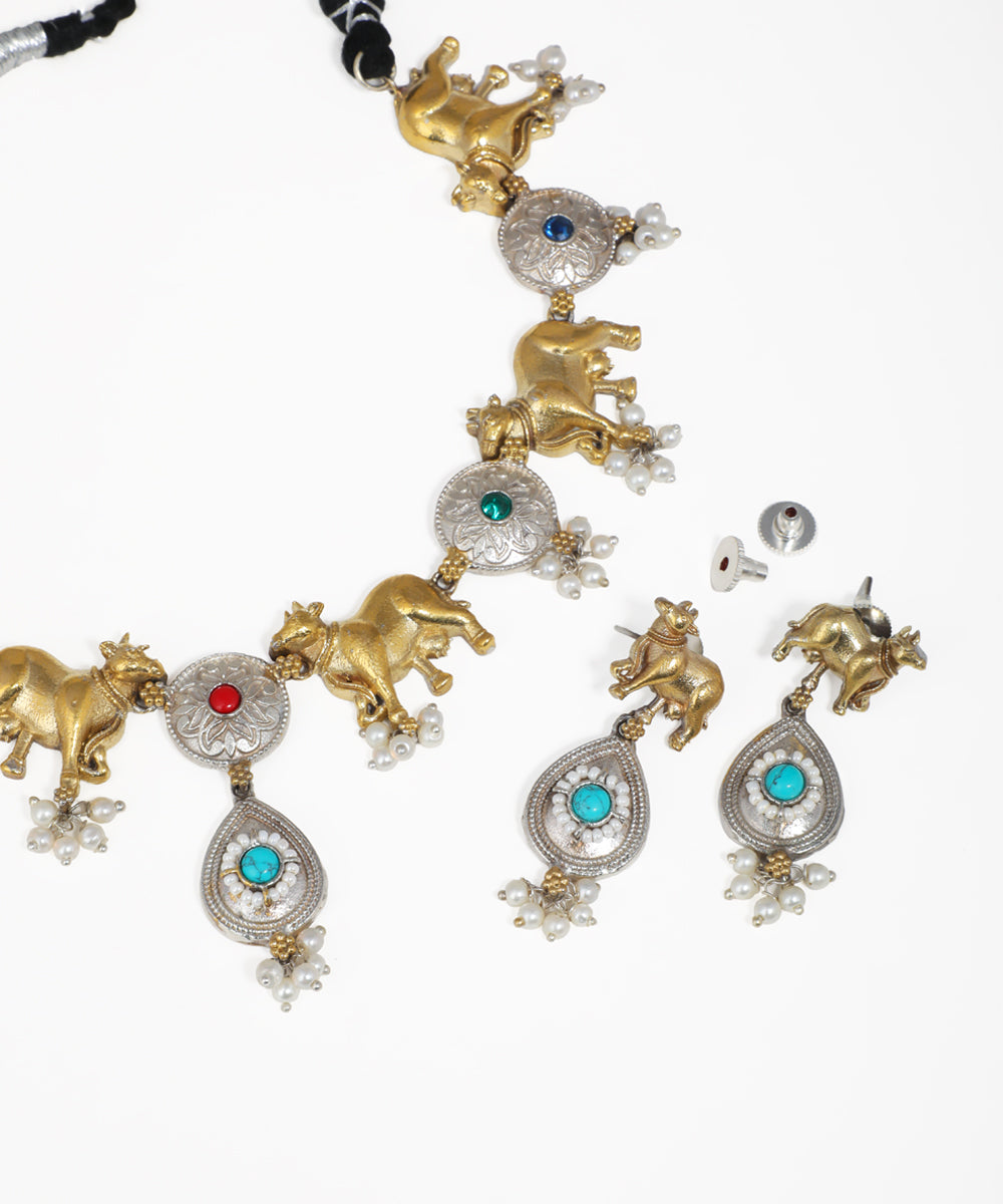 Dual-tone animal motif oxidised necklace set with matching drop earrings
