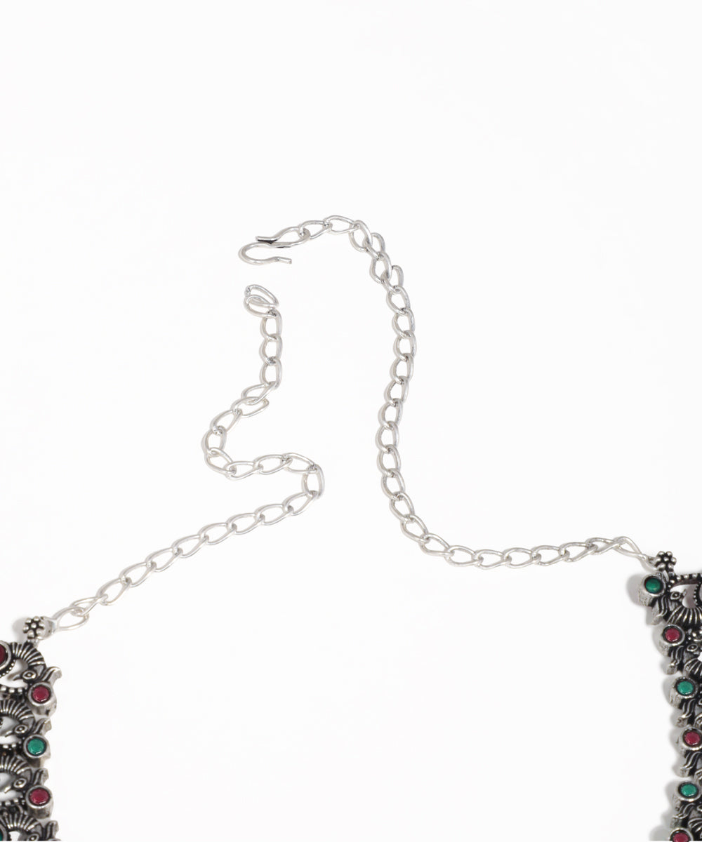 Indian oxidised jewelry set featuring peacock designs, gemstone accents and pearl drops