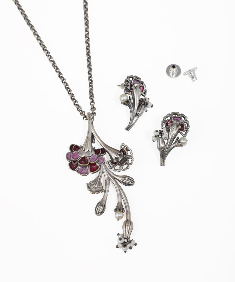 Oxidised floral vine necklace set with pink stone accents, pearl details and matching earrings