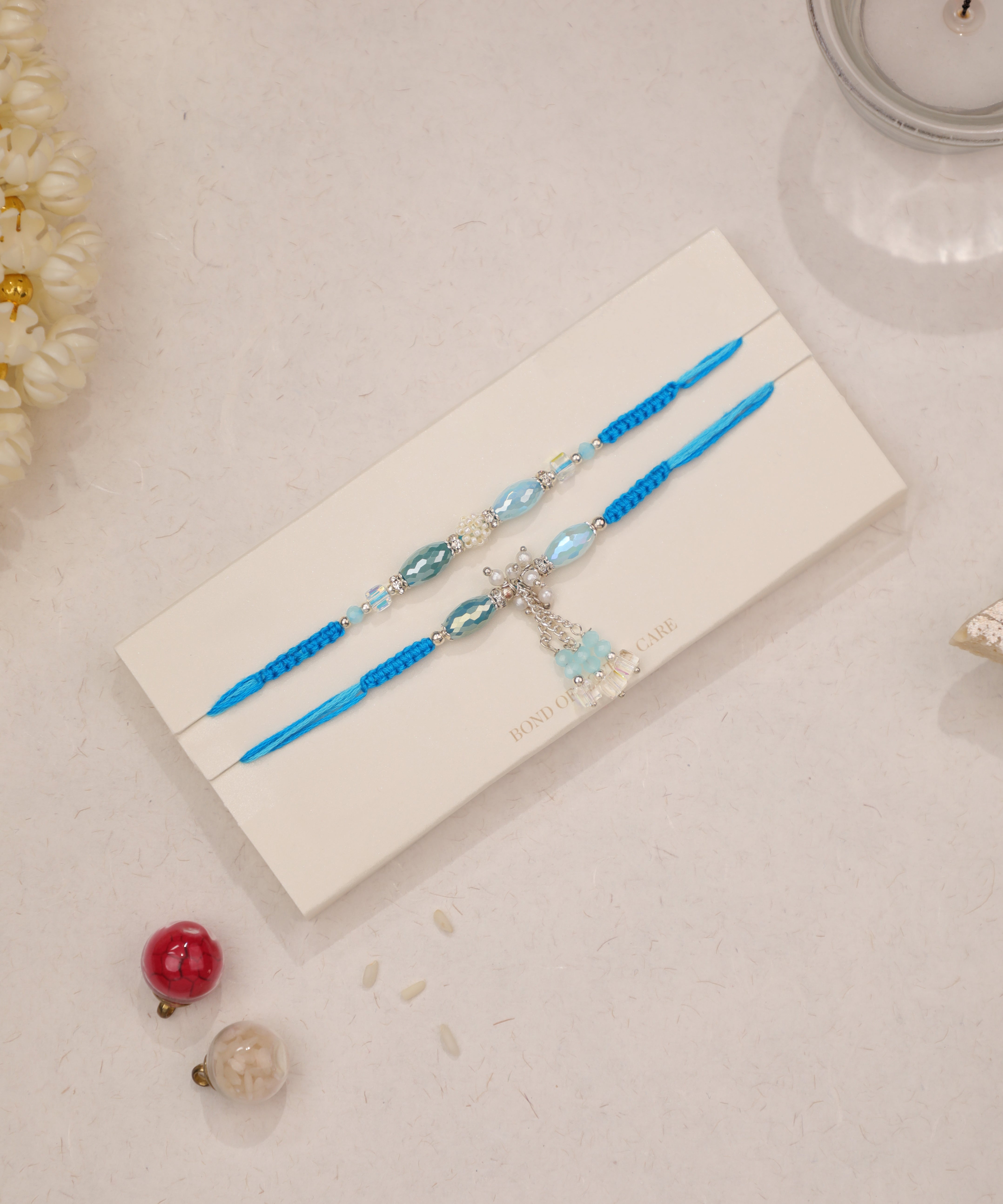 Aqua Beaded Rakhi Set with Charms | Stylika