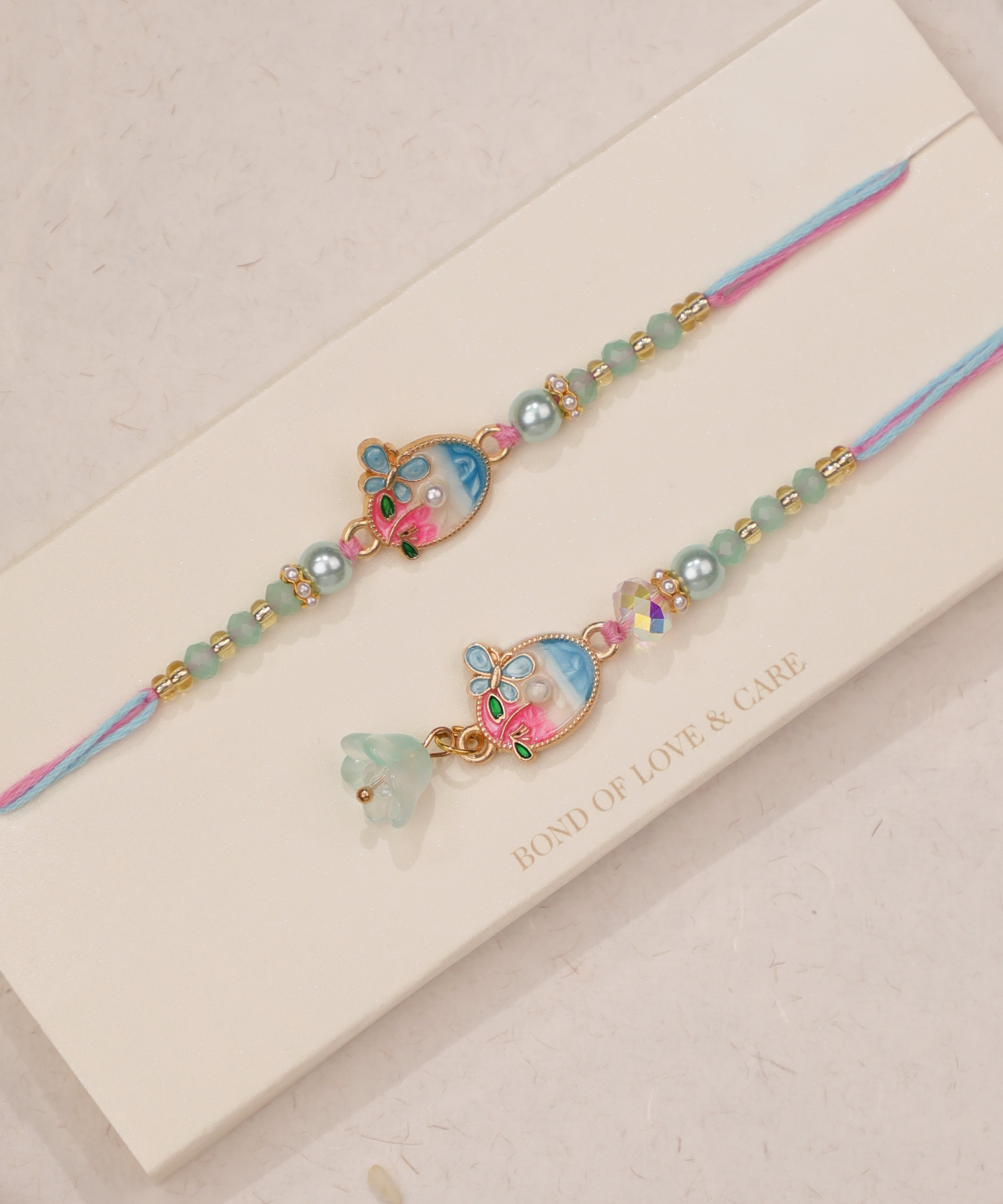 Pastel Floral Bhaiya Bhabhi Rakhi Duo Set | Stylika