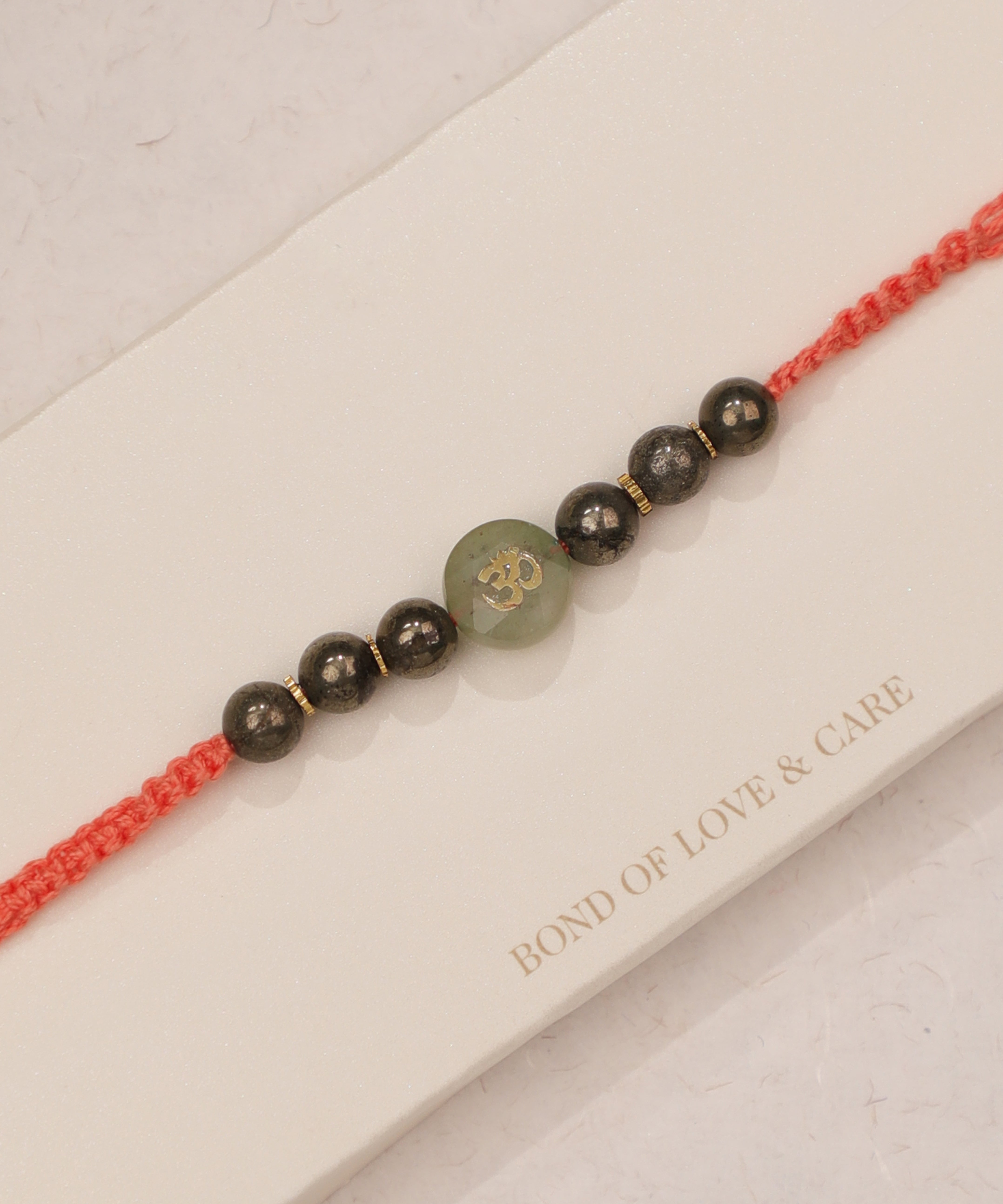Om Symbol Beaded Rakhi Thread for Brother | Stylika