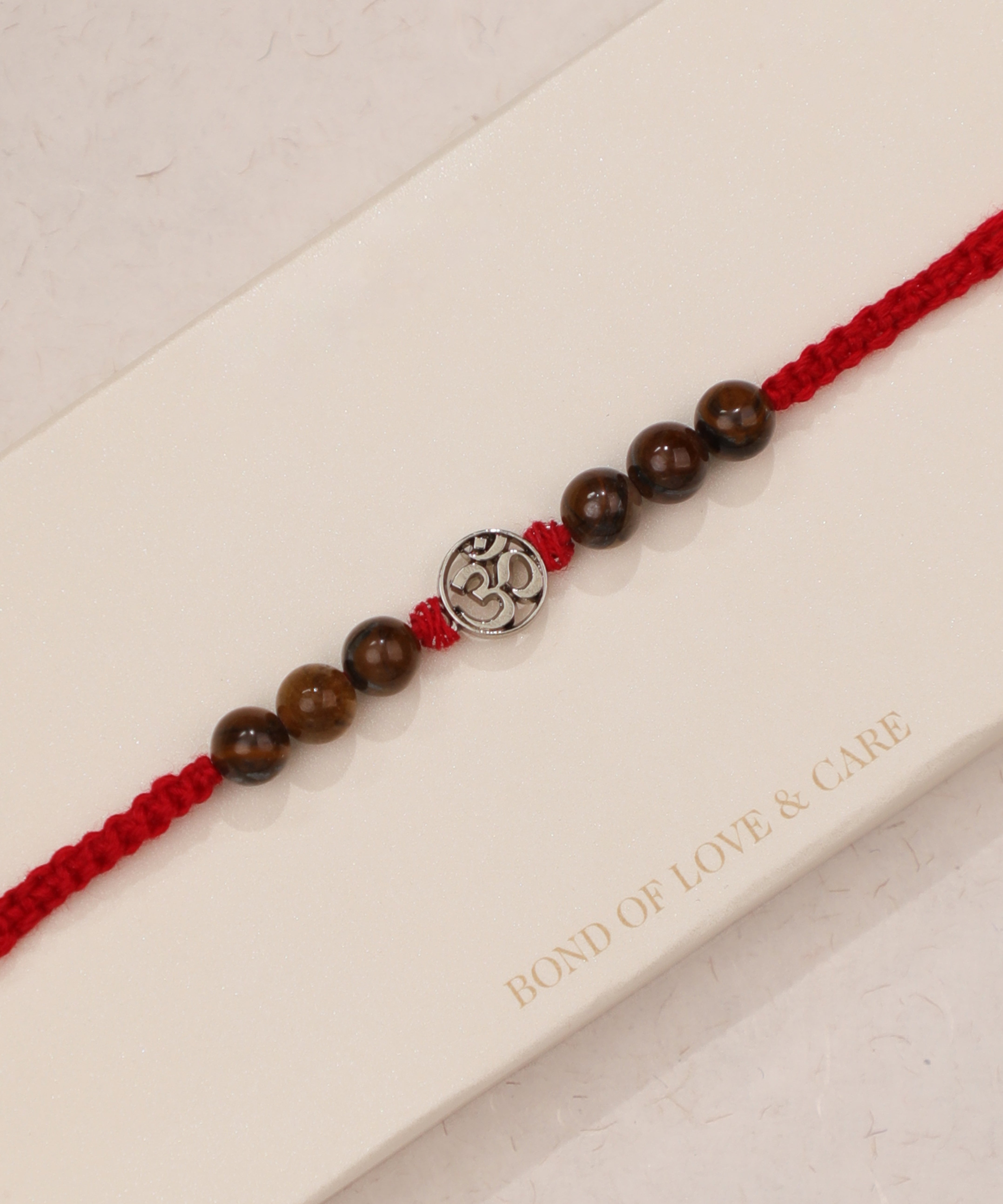 Symbolic Om Beaded Rakhi | Stylika