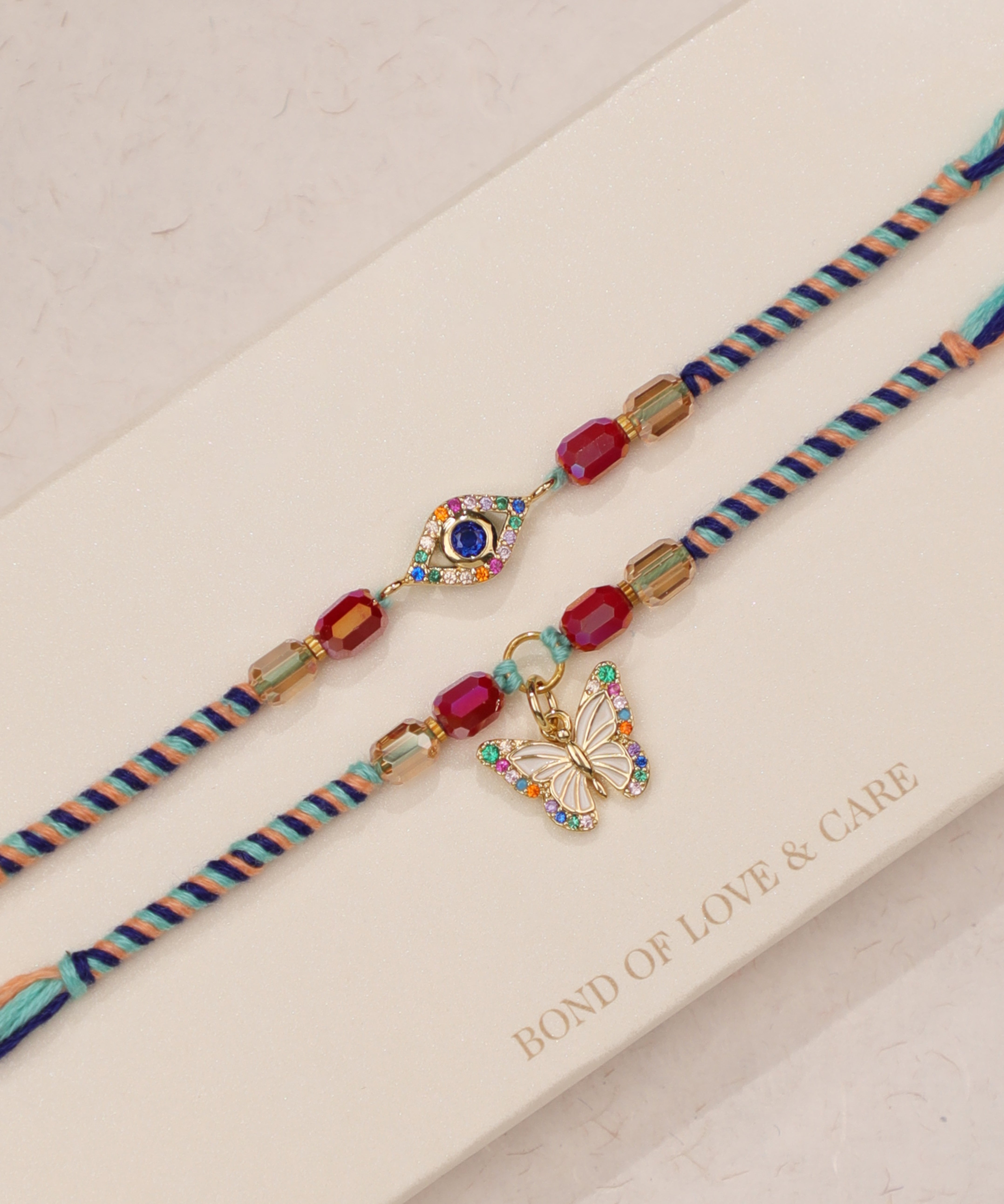 Evil Eye & Butterfly Charm Rakhi Set | Stylika
