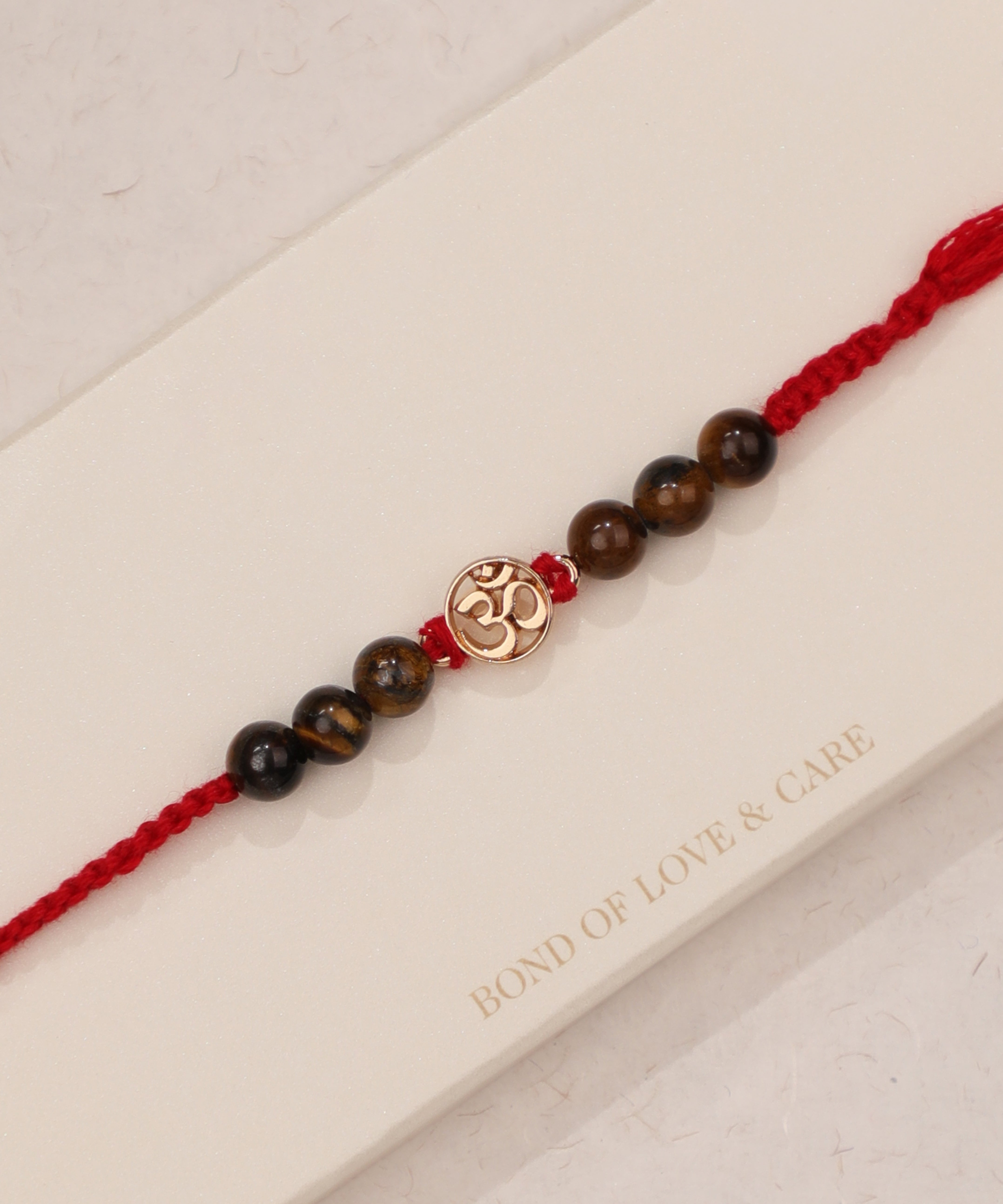 Symbolic Om Beaded Rakhi | Stylika