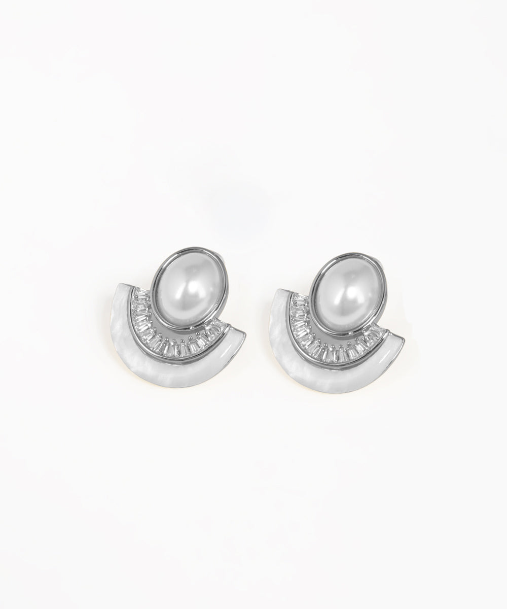 Gold fan-shaped stud earrings featuring a contemporary arc silhouette