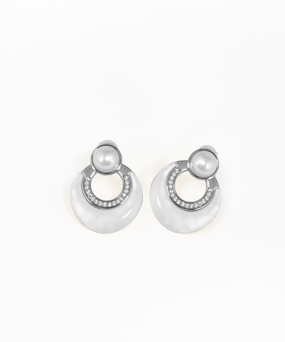 Gold arch drop earrings featuring iridescent disc accents