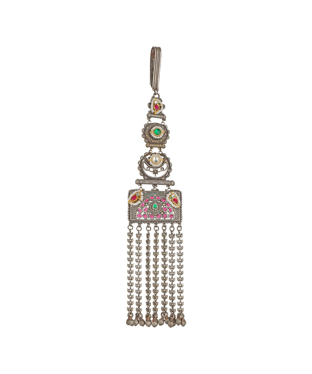 Cascading long silhouette of an ornate oxidised Juda