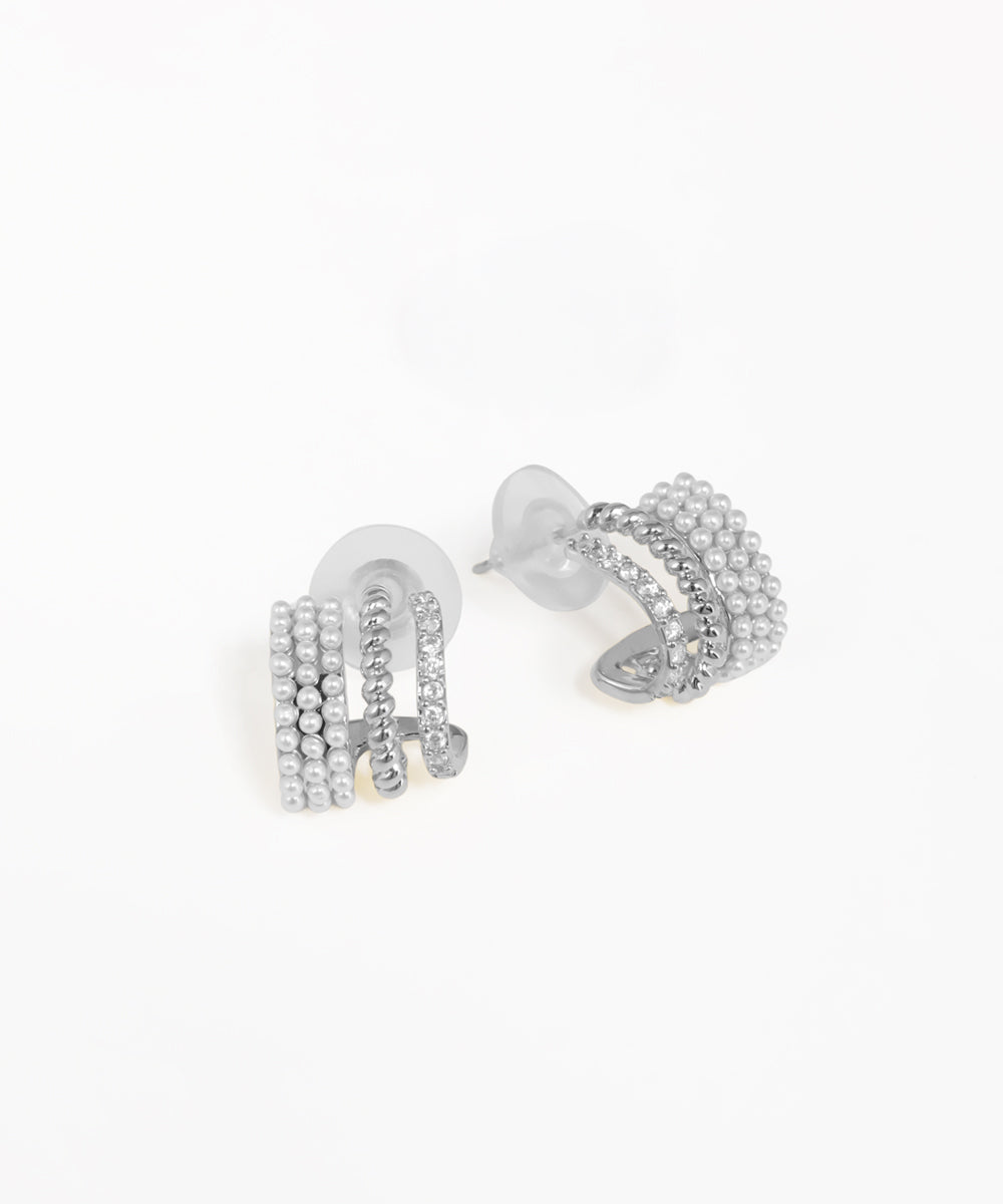 Fashion-forward arc earrings with stacked curved metal detailing