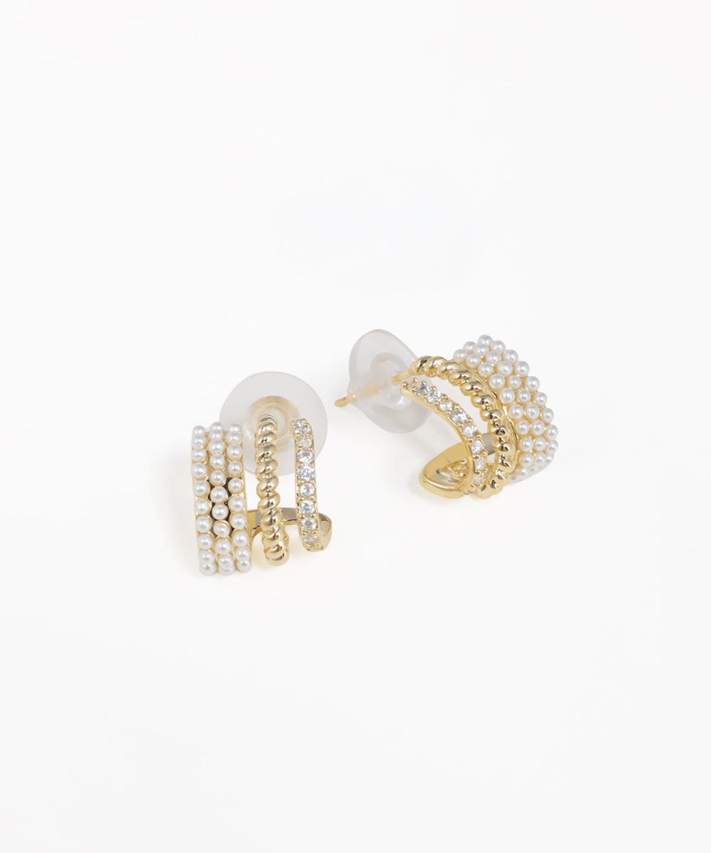 Sophisticated multi-row arc earrings with gold-tone finish and layered design