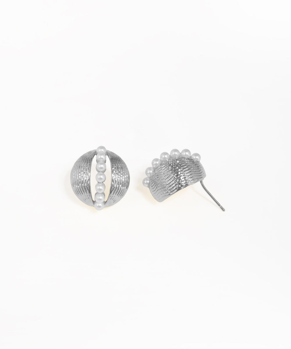 Contemporary pearl stud earrings with sculptural dome silhouette and gold finish