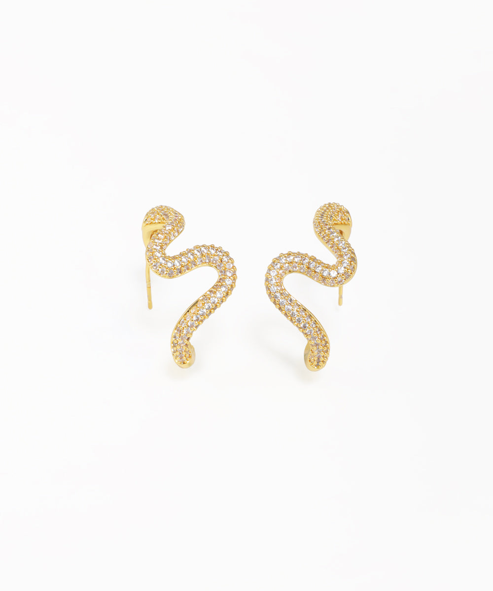 Modern gold-tone snake earrings with pavé sparkle and wavy silhouette