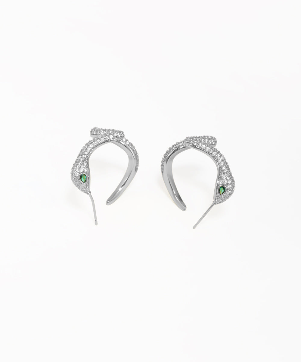 Contemporary wavy serpent earrings with pavé crystal finish