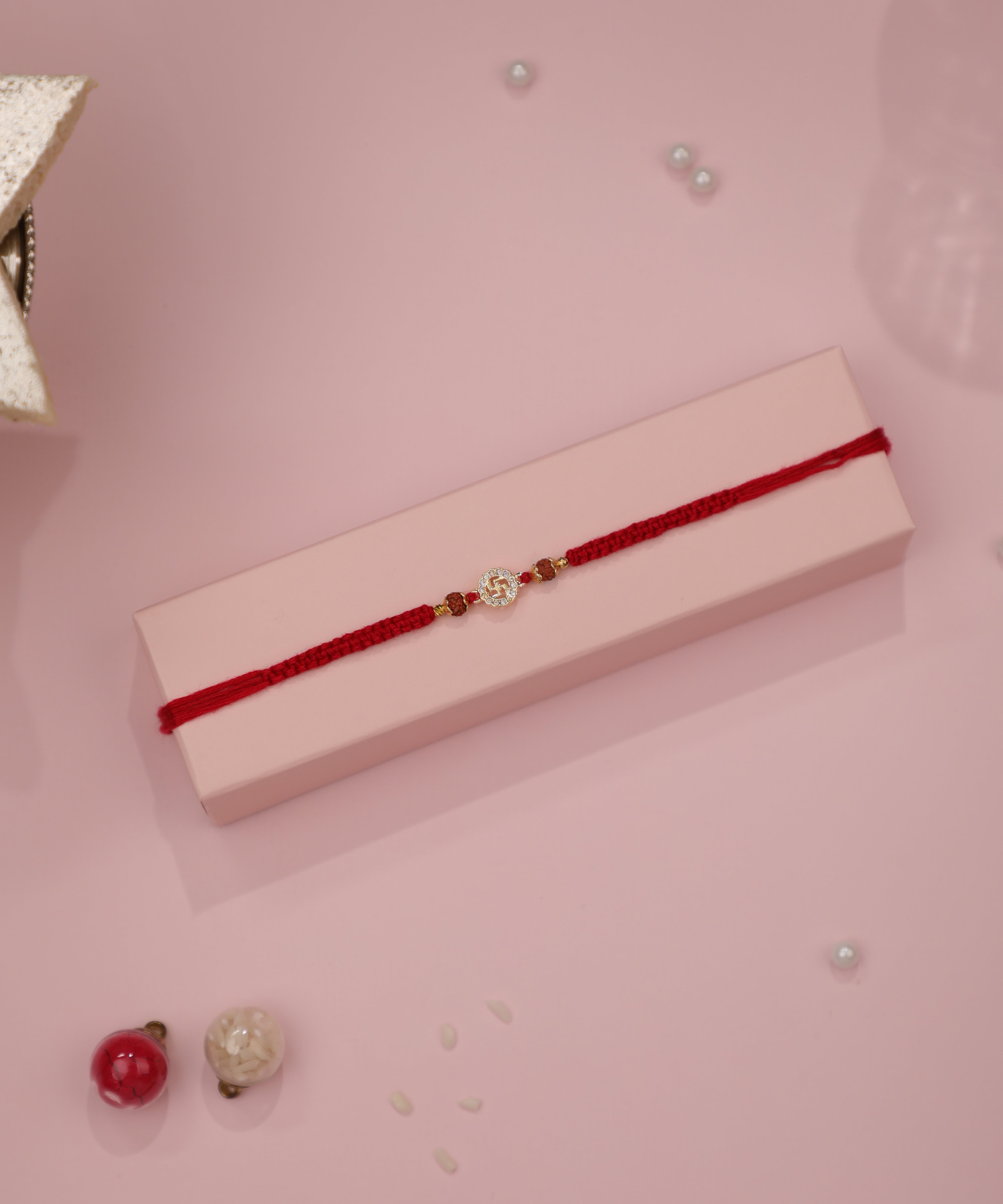 Sparkle Swastika Motif Red Thread Rakhi for Celebrations | Stylika