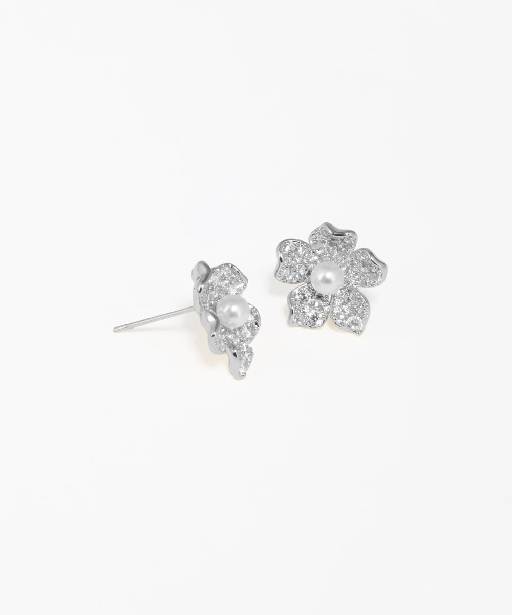 Floral pearl stud earrings with delicate petal design