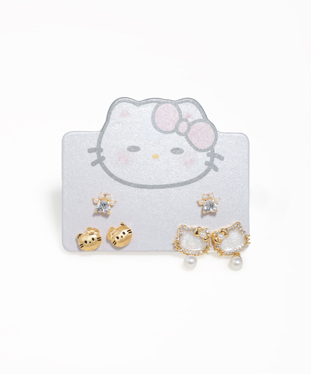 Playful cat-themed earring set featuring kitty charms and paw print studs