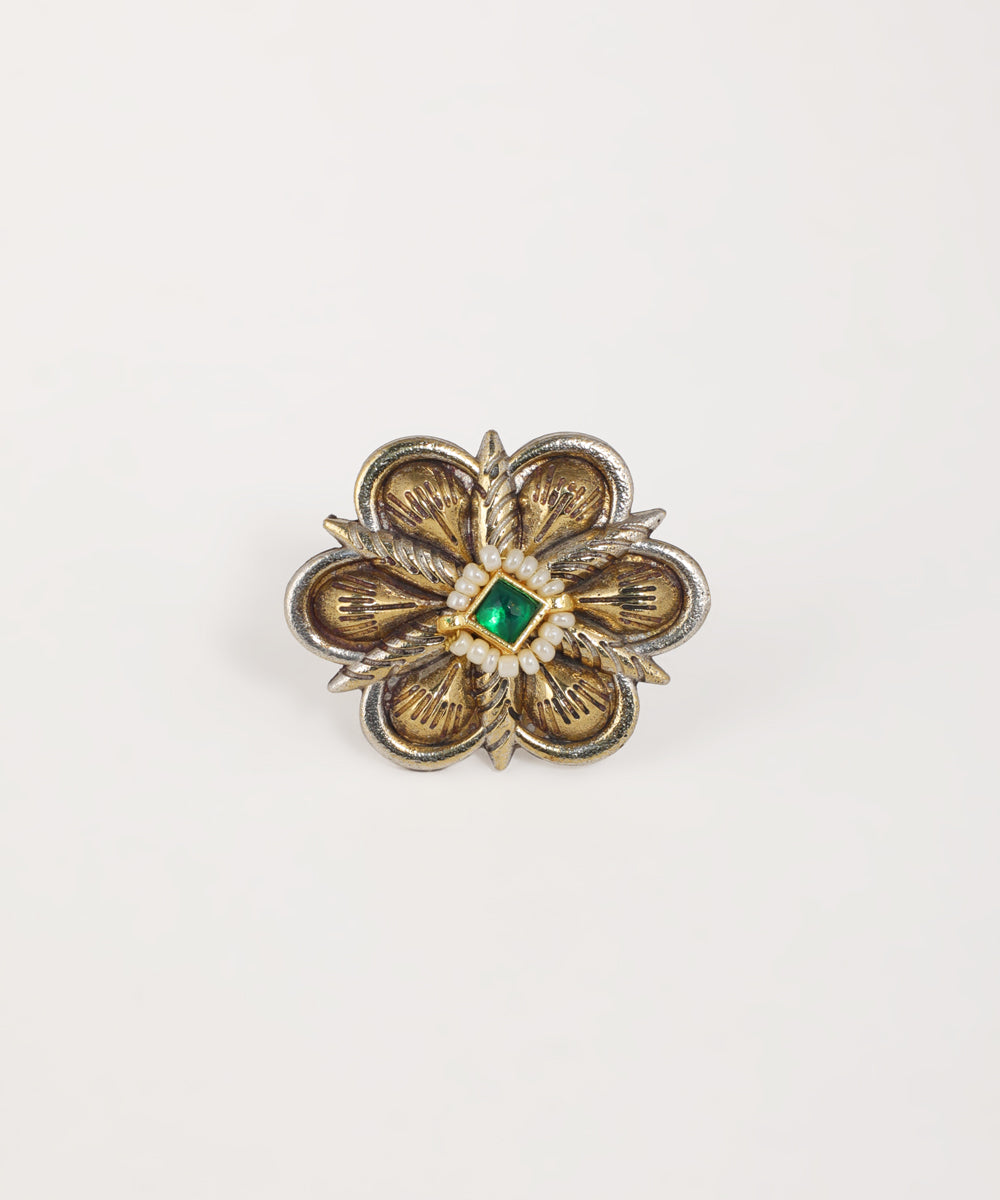 Oxidised floral statement ring featuring gemstone accents and handcrafted metalwork