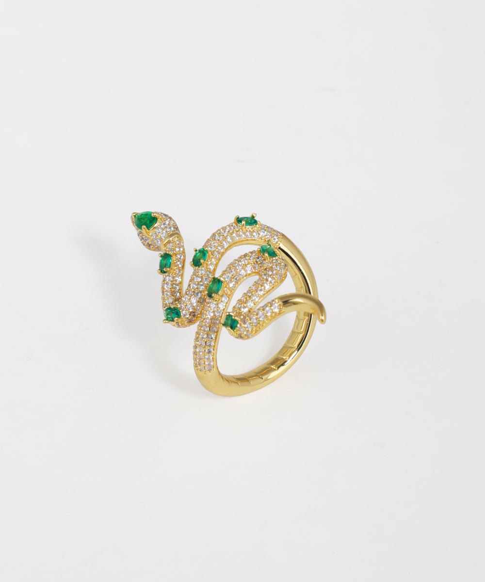 Gold snake ring featuring shimmering crystal accents