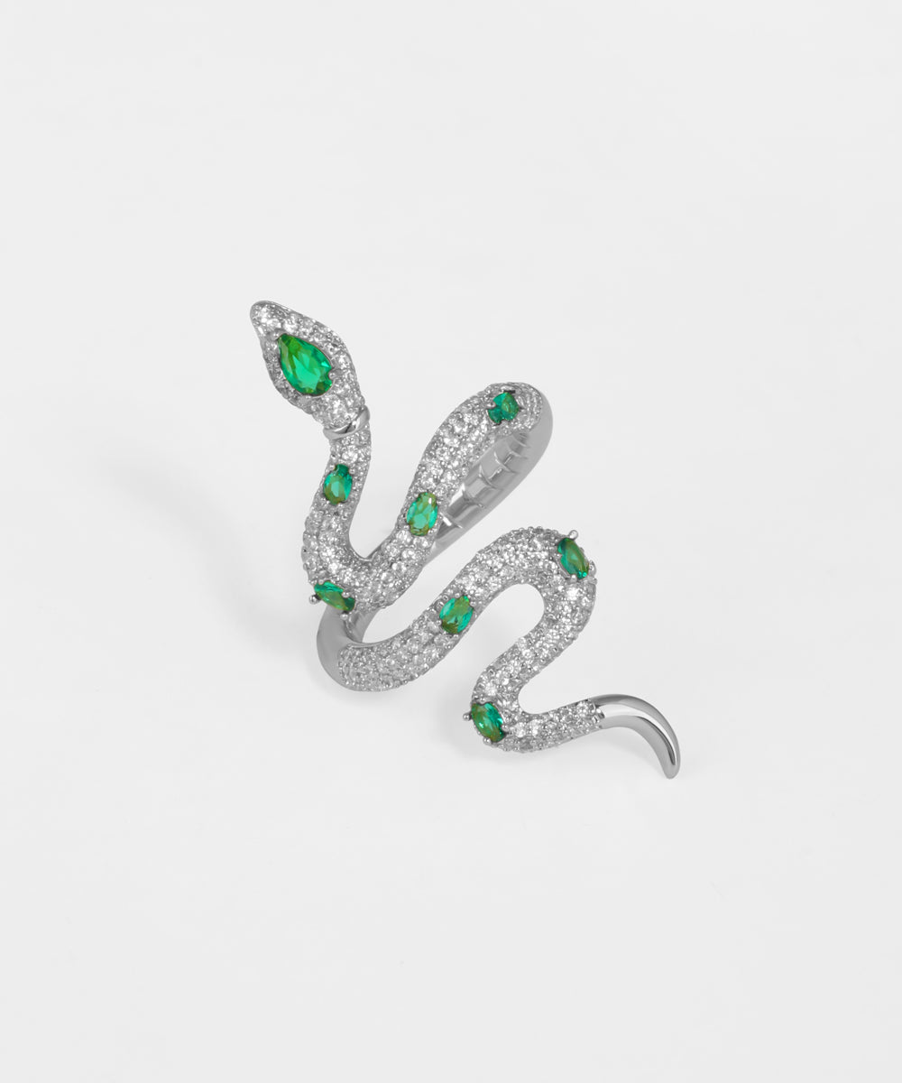 Snake-inspired ring with sparkling stones and gold finish