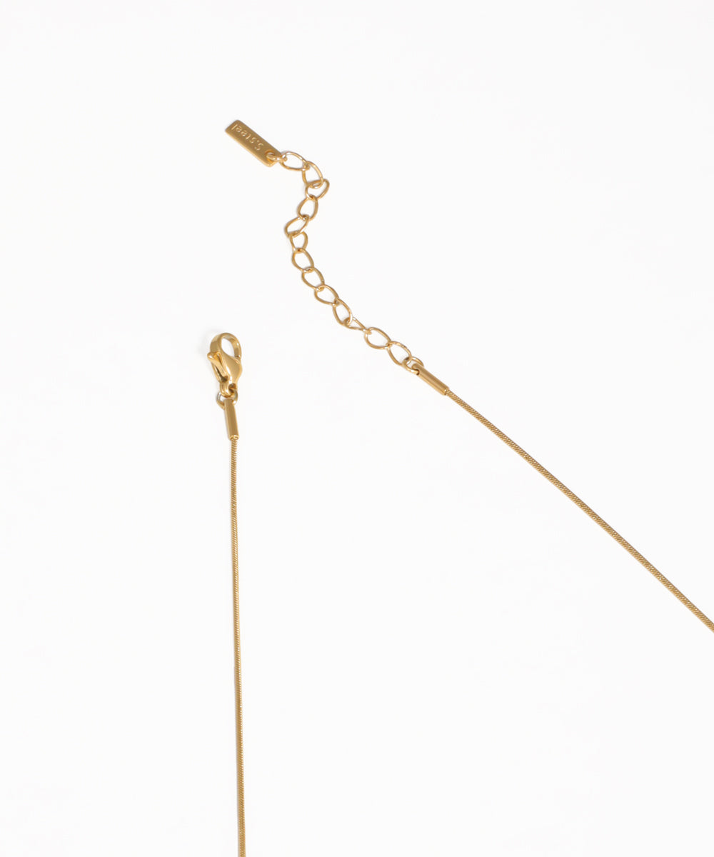 Gold organic bead necklace with modern minimalist design