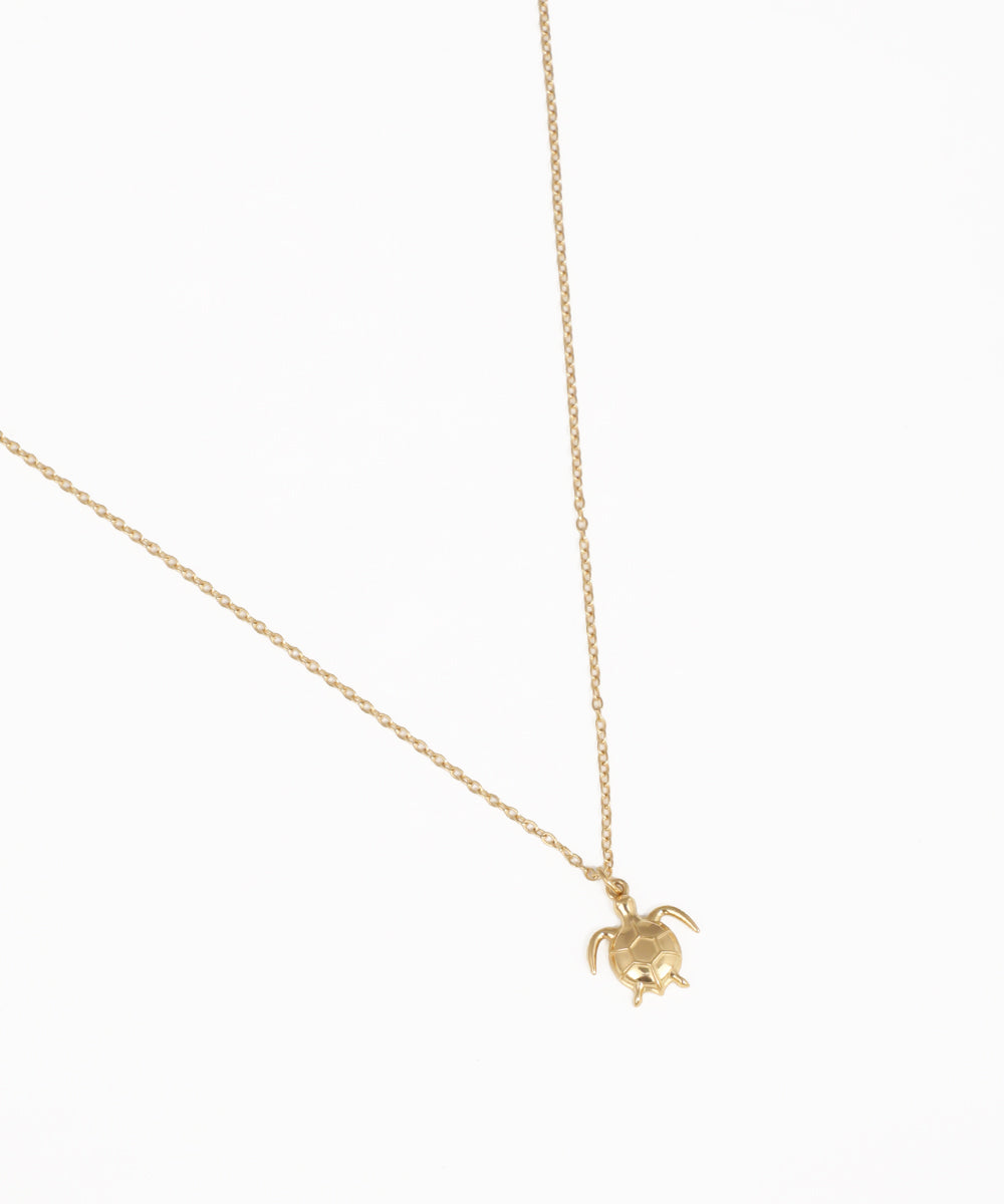 Everyday turtle charm pendant necklace with delicate gold-tone chain