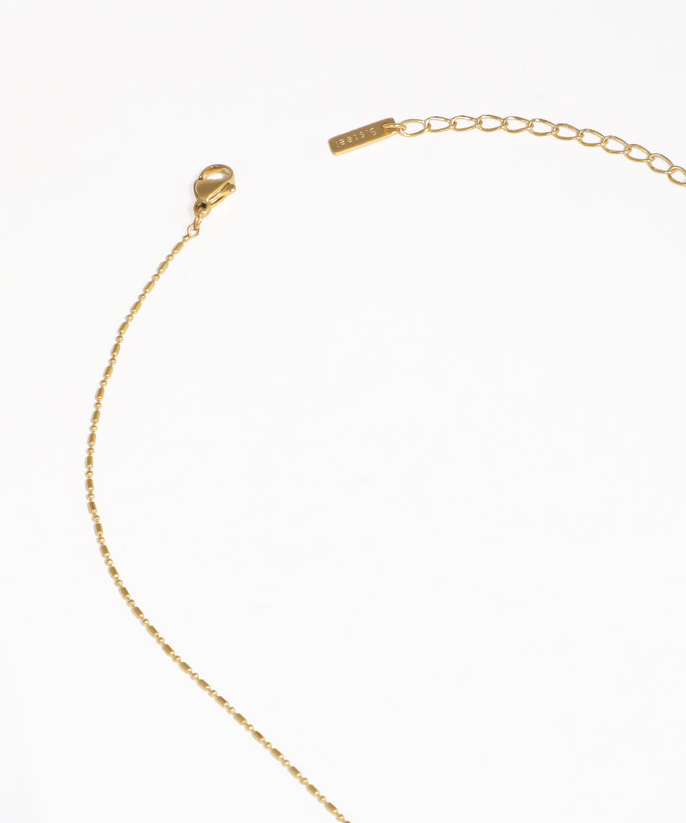 Gold pearl pendant necklace with minimalist fine chain design