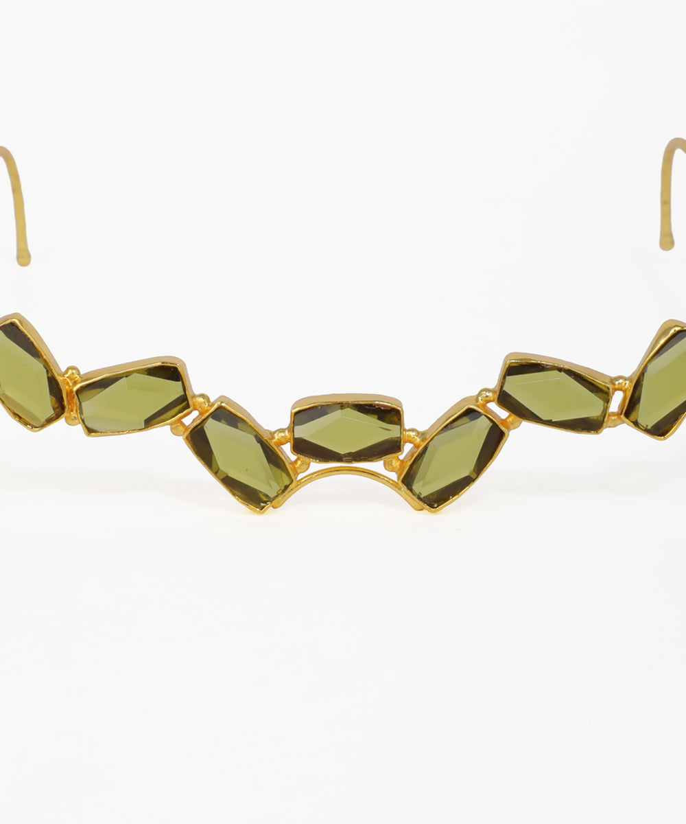 Gold facelet with geometric green gemstone links and elegant wire frame