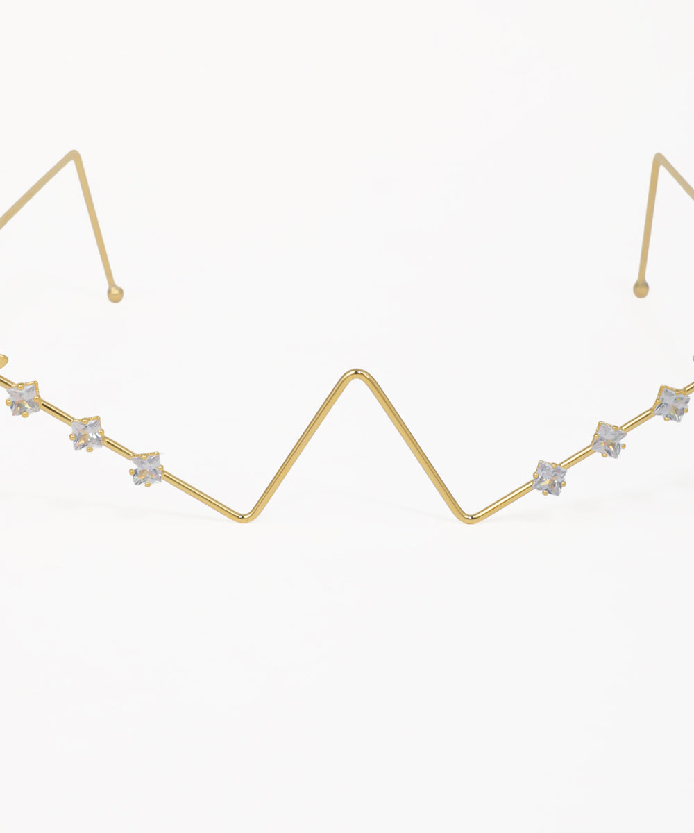 Fashion facelet with geometric gold lines, butterfly details, and crystal embellishments