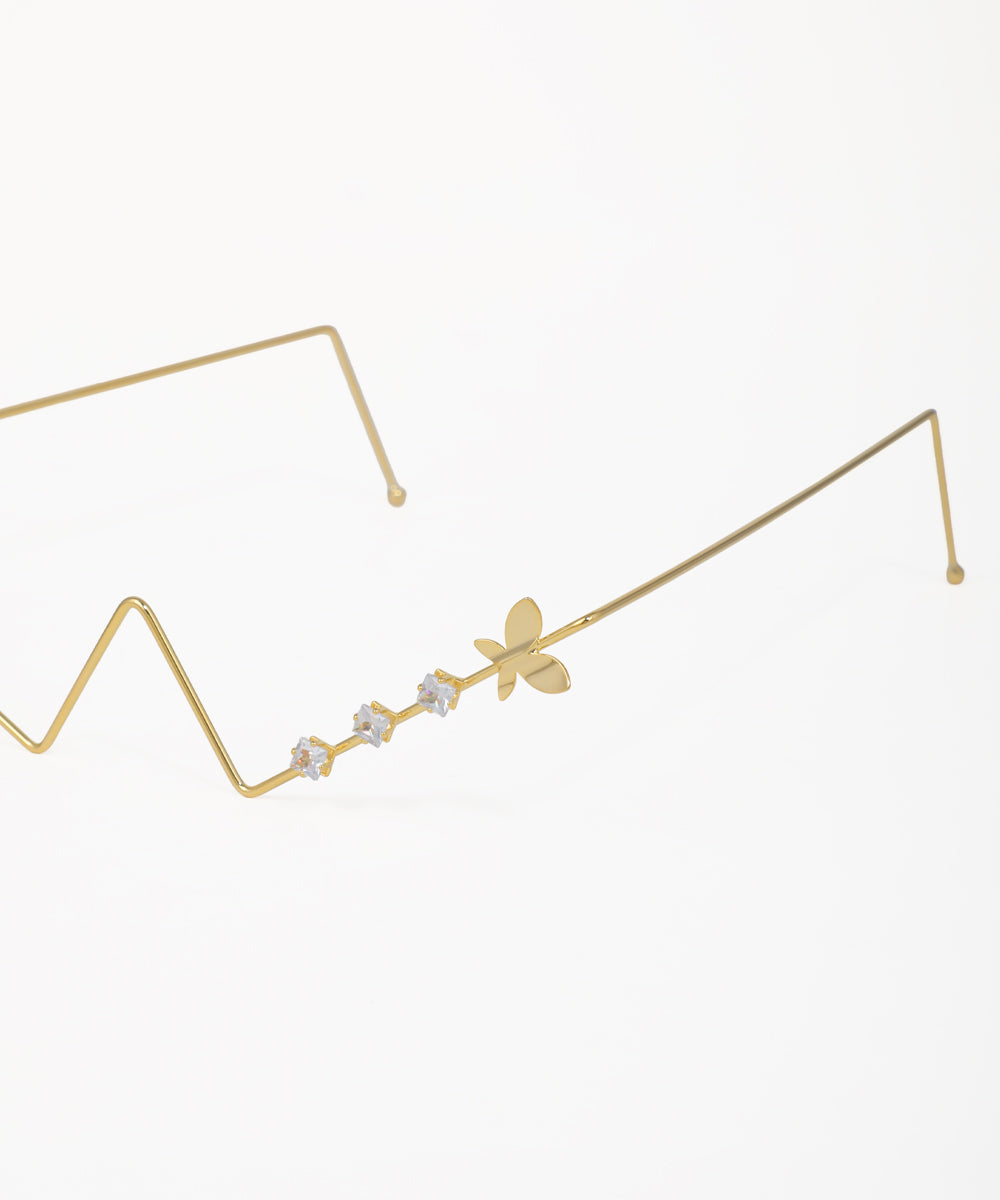 Modern zig-zag facelet with butterfly motifs and crystal accents