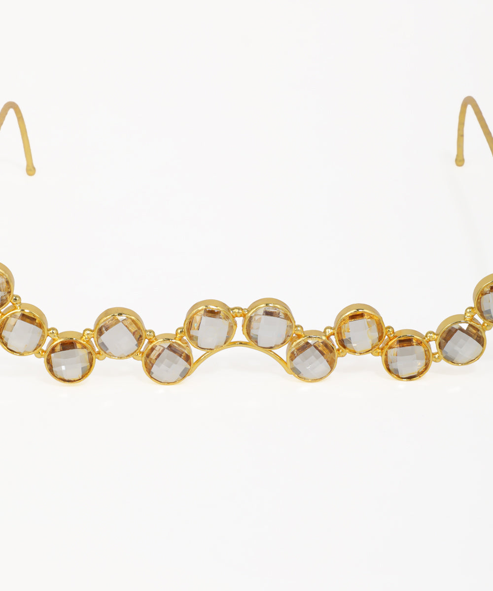 Gold facelet with cascading round crystals and elegant wavy shape