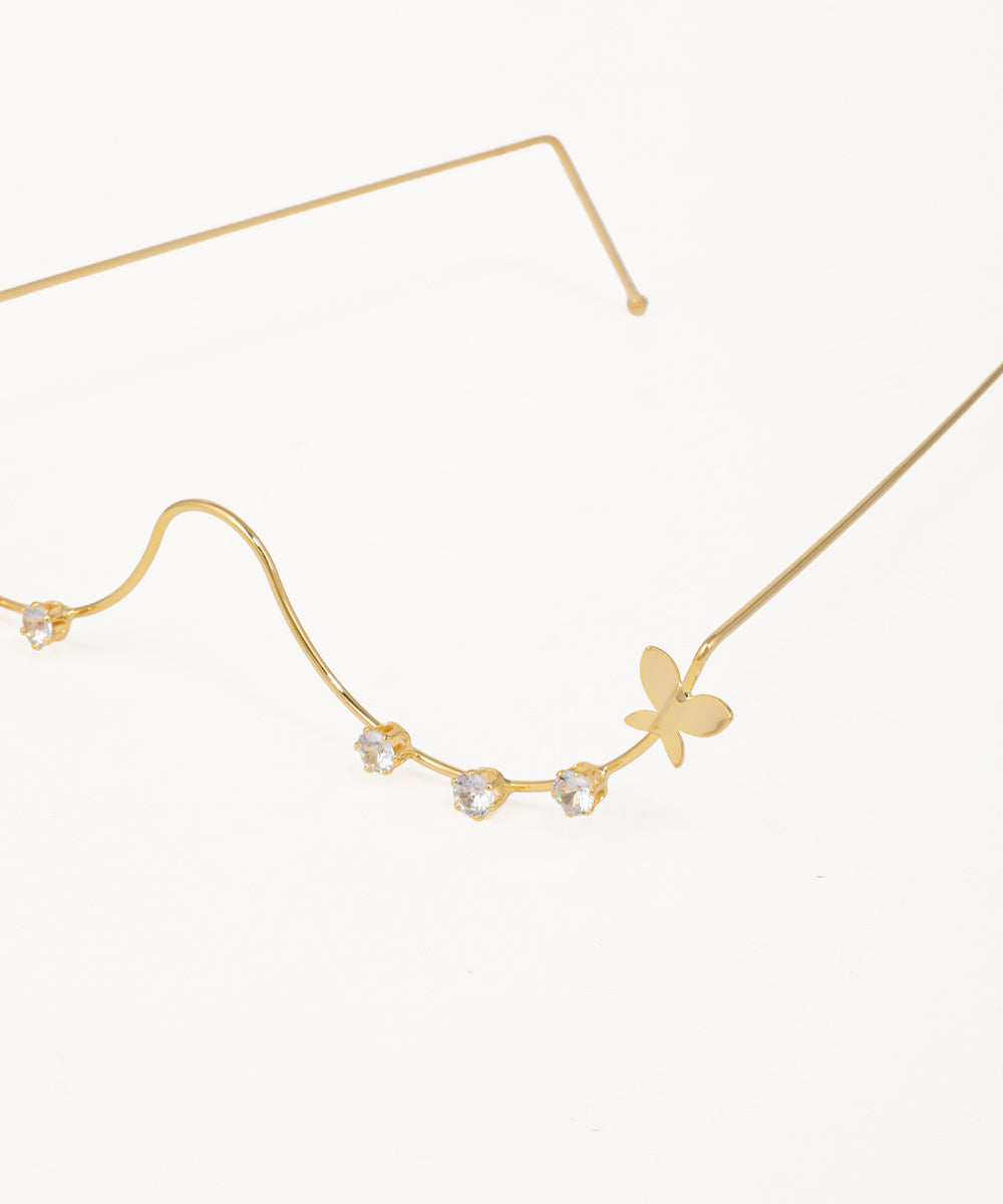 Gold wire facelet with butterfly details and delicate crystal stone accents