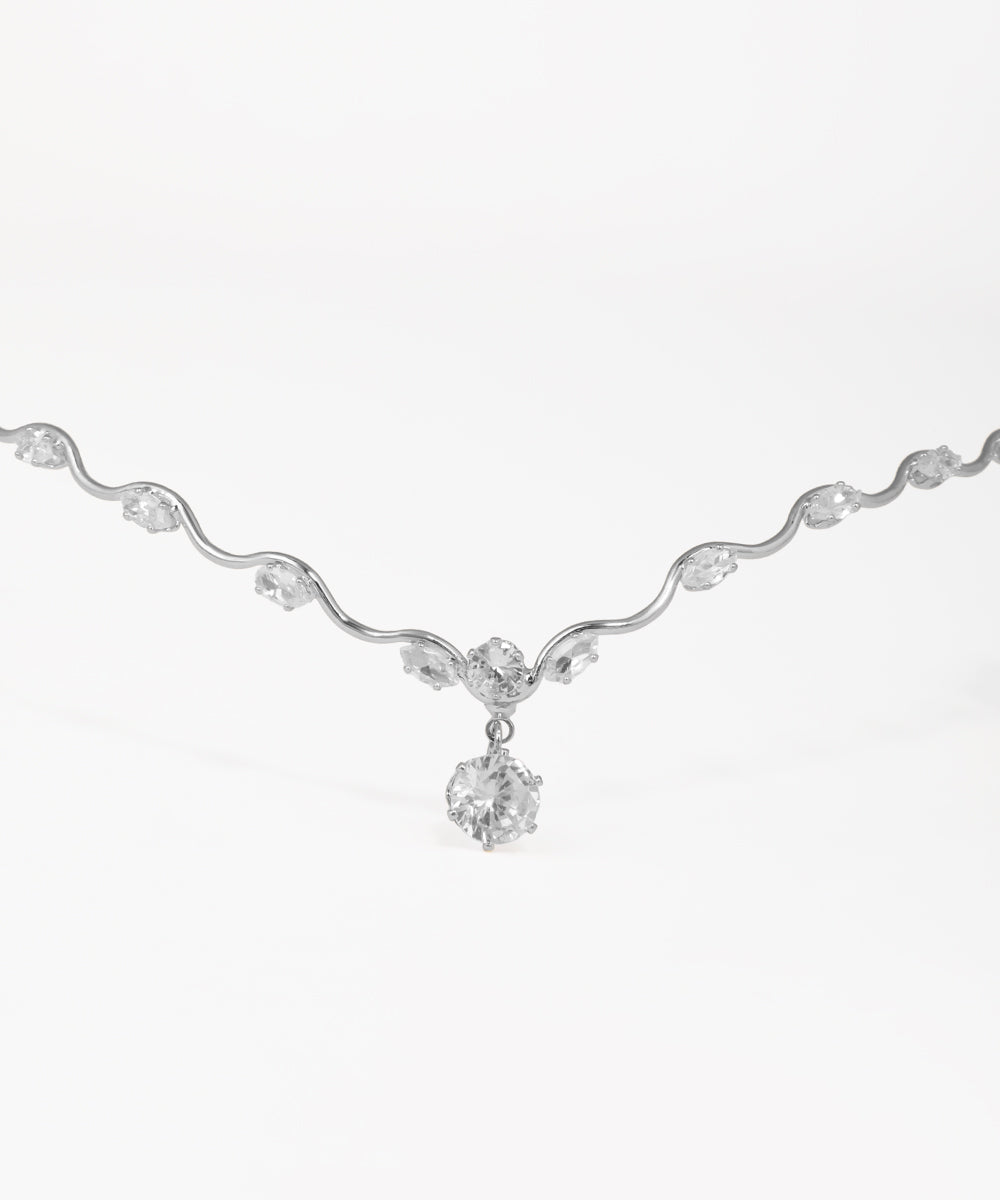 Crystal wedding tiara featuring cascading stone accents and silver finish