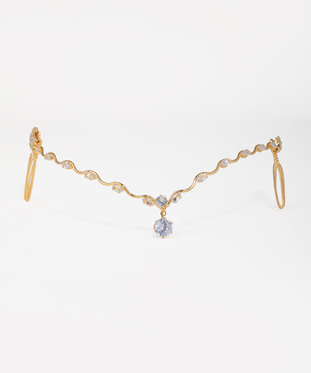 Crystal bridal tiara featuring a flowing wave design and hanging stone drops