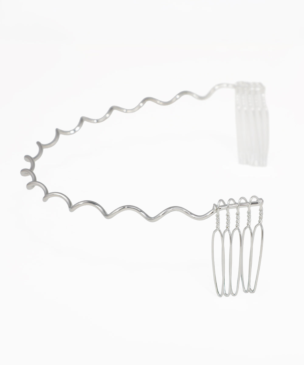 Silver-tone hair tiara with elegant wave design and secure fasteners
