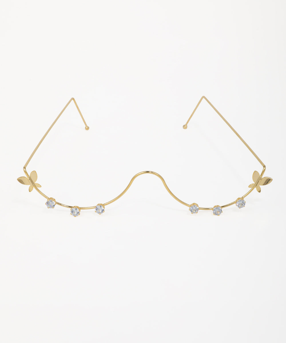 Gold-tone facelet with wavy wire, butterfly motifs, and six clear cubic zirconia stones.