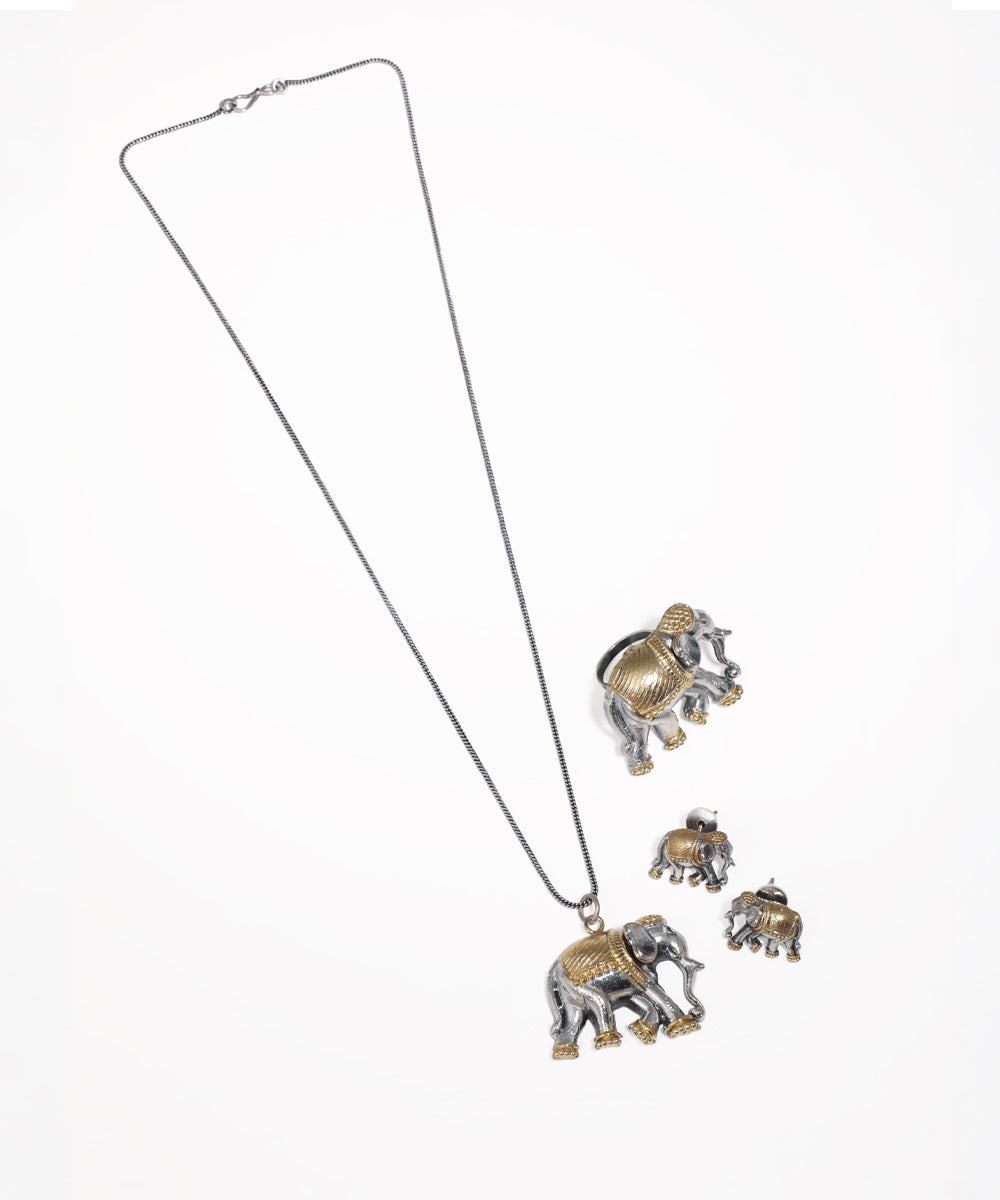 Oxidized silver-tone necklace with elephant pendant and matching stud earrings, gold-tone accents