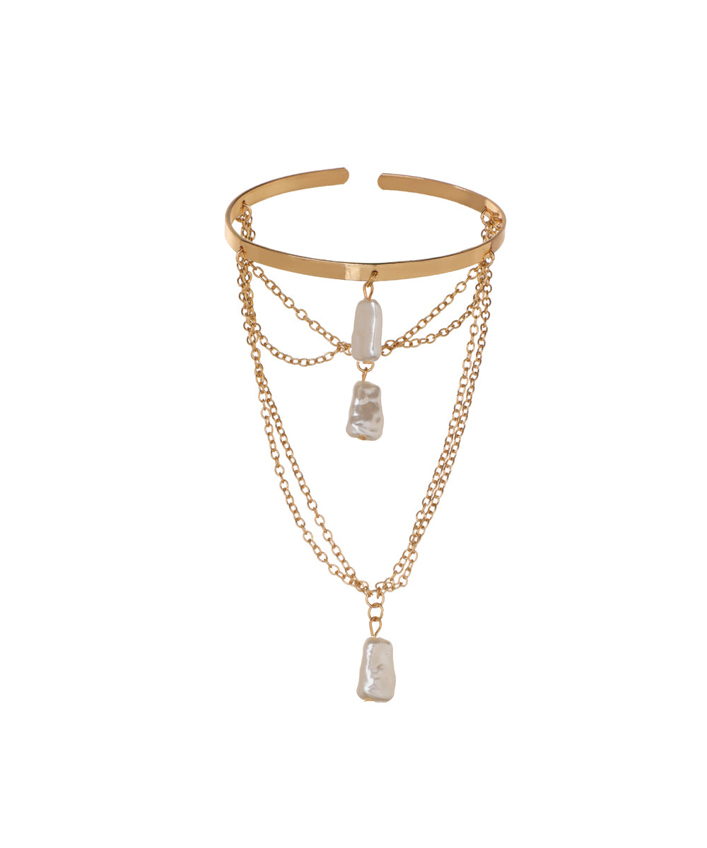 Gold-tone arm cuff with multi-layered chains and baroque-style drops