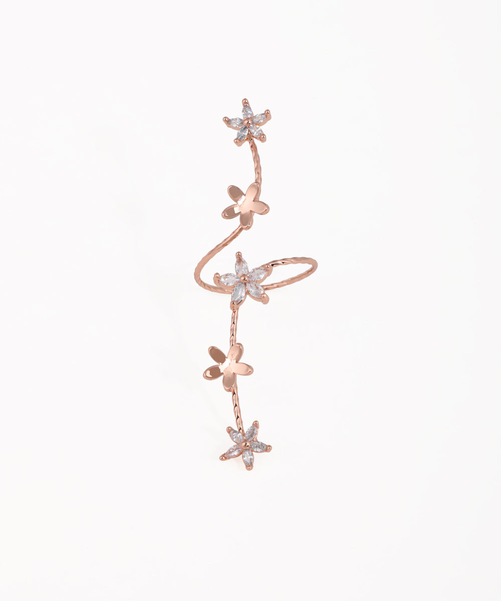 Rose-gold-tone ring with twisting floral vine and clear sparkle stones