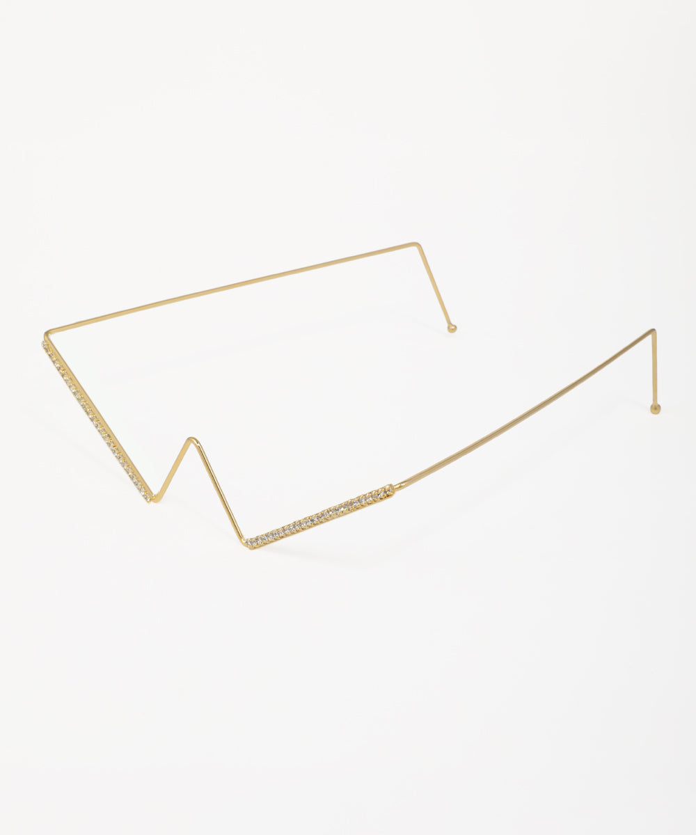 Gold-tone facelet with geometric V-shape and clear stone accents