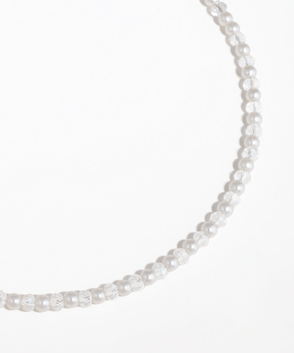 Pearl necklace on a white background
