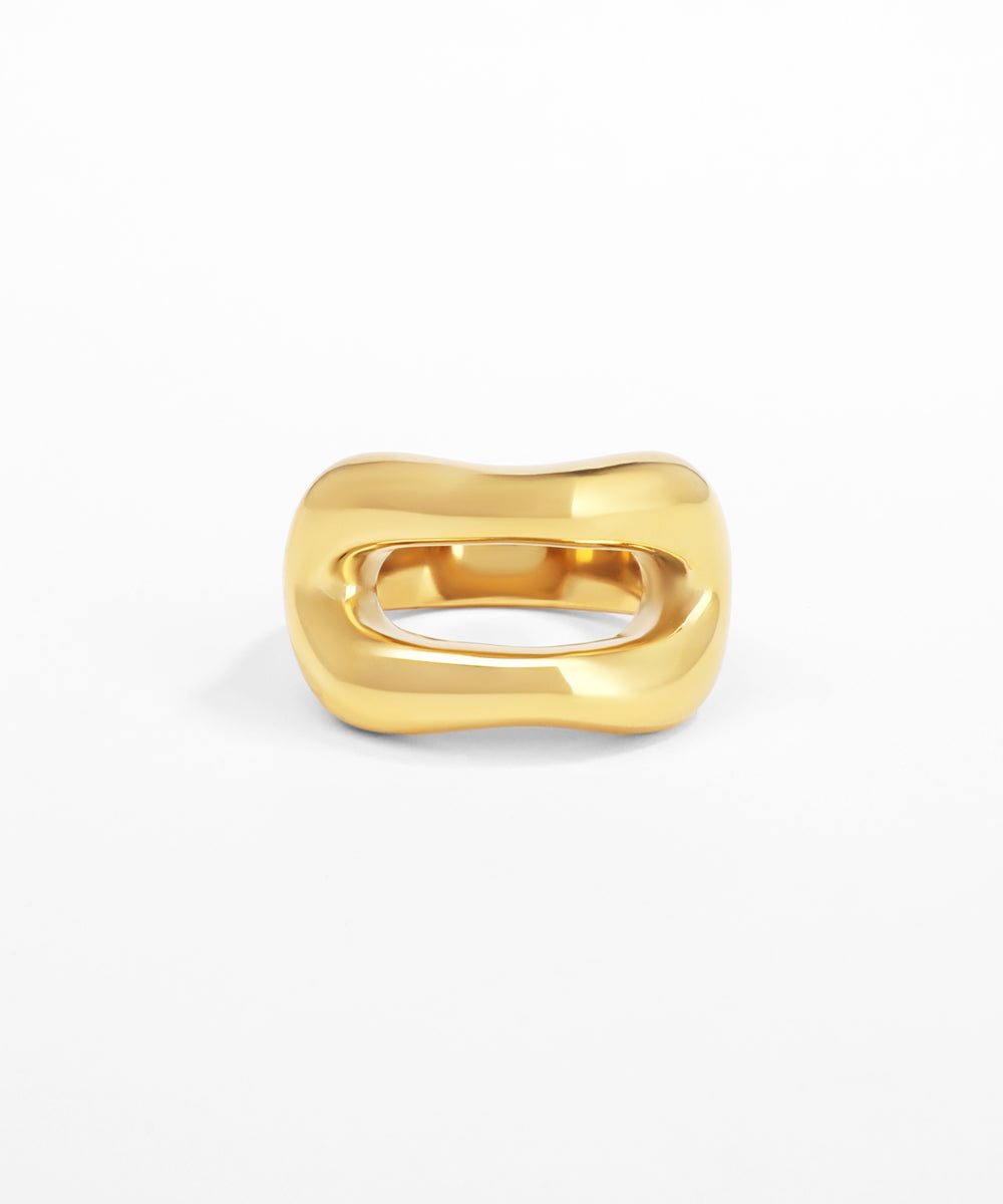 Gold ring on a white background