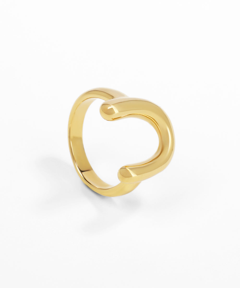 Gold ring on a white background