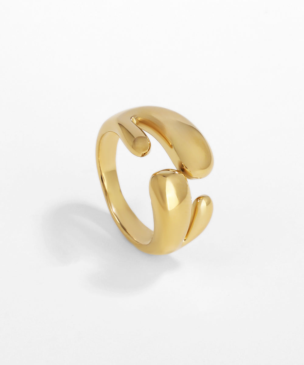 Gold ring on a white background