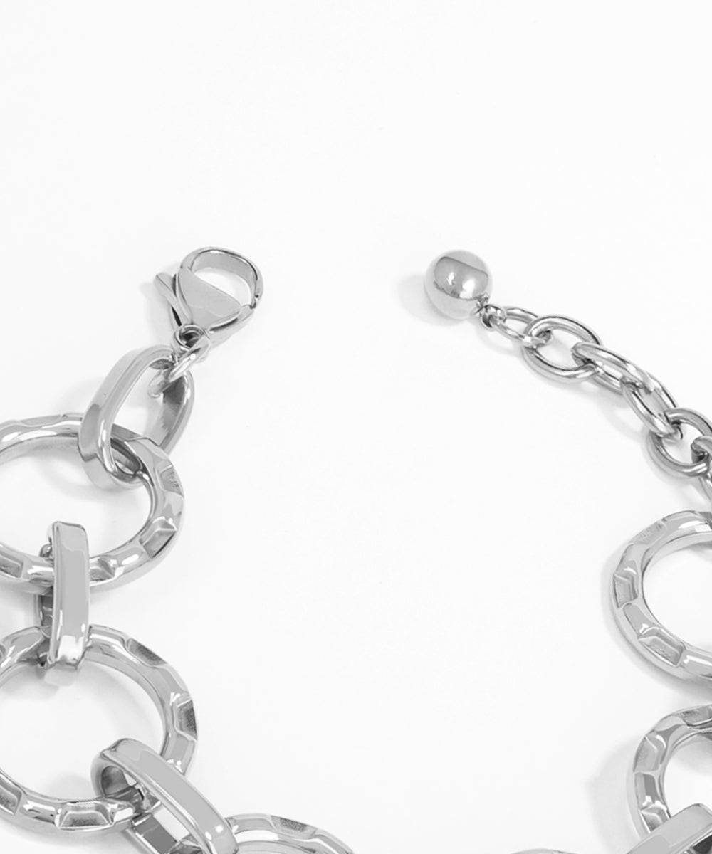 Silver chain bracelet on a white background