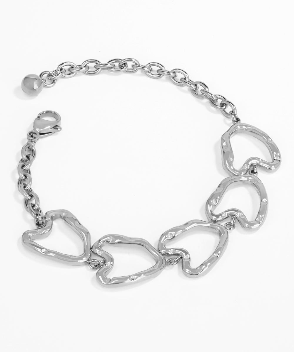 Silver bracelet with heart-shaped links on a white background