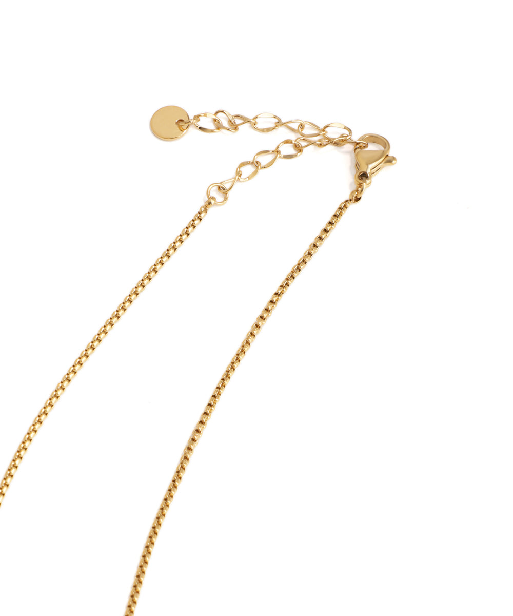 Gold bracelet on a white background