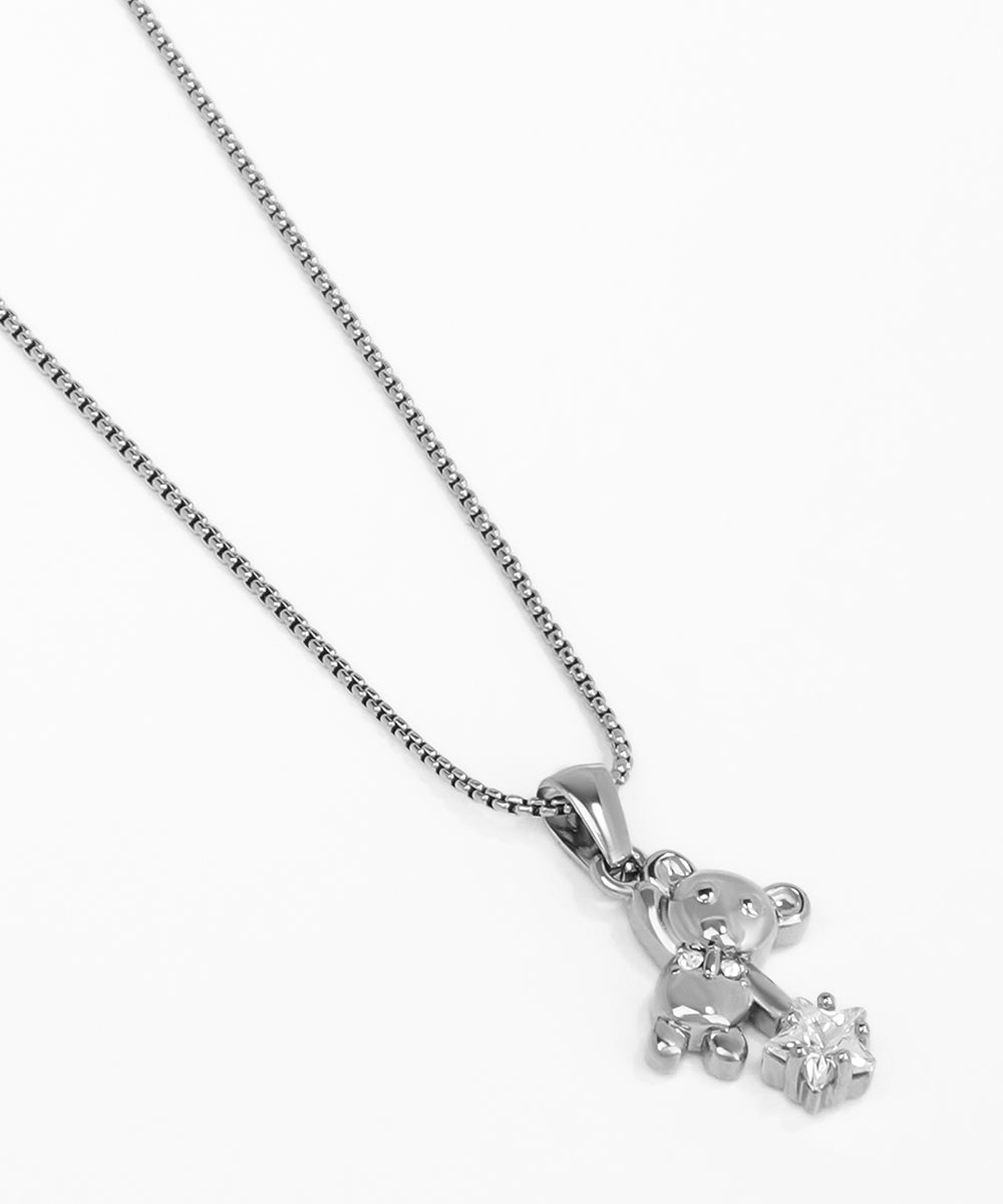 Silver teddy bear pendant on a chain against a white background
